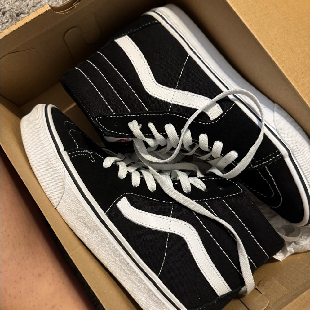 Vans Black and White High-Top Sneakers